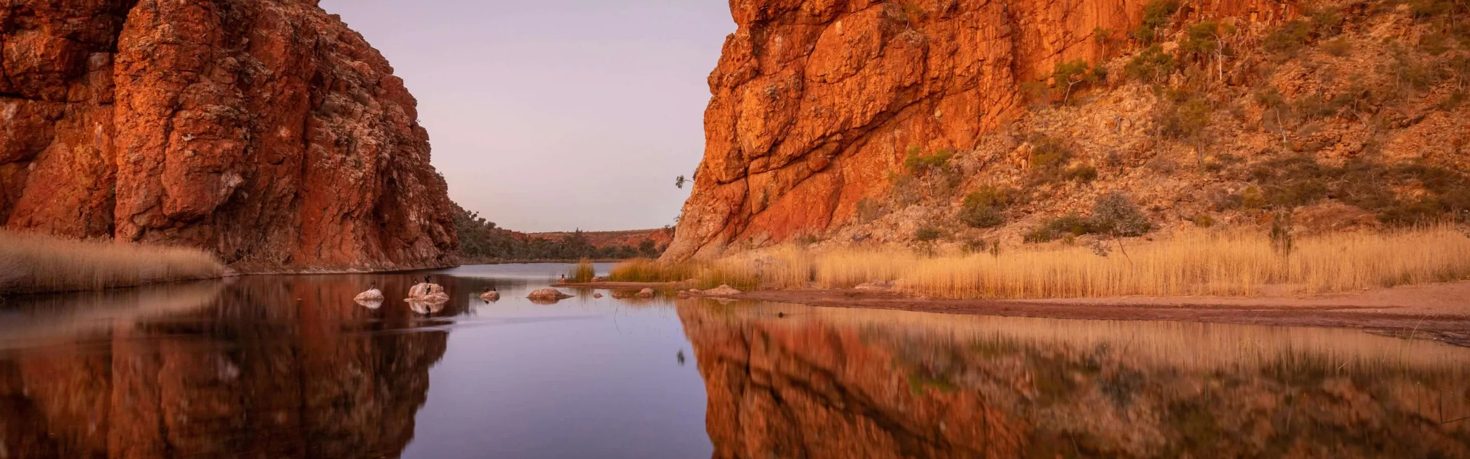 Gorge and cliffs with reflection of the sky