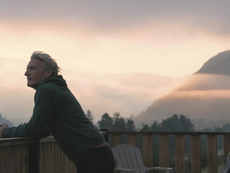 Man overlooking mountain
